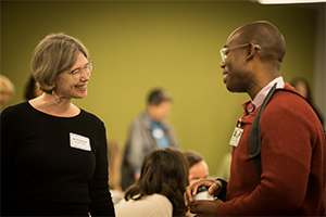 women and man in conversation