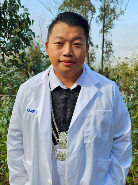 Man wearing white coat
