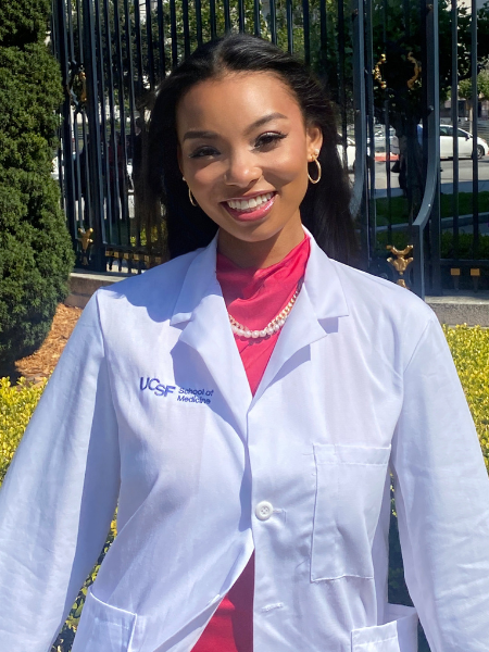 Woman wearing white coat