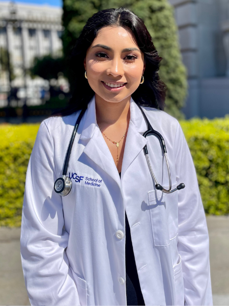 Woman wearing white coat 