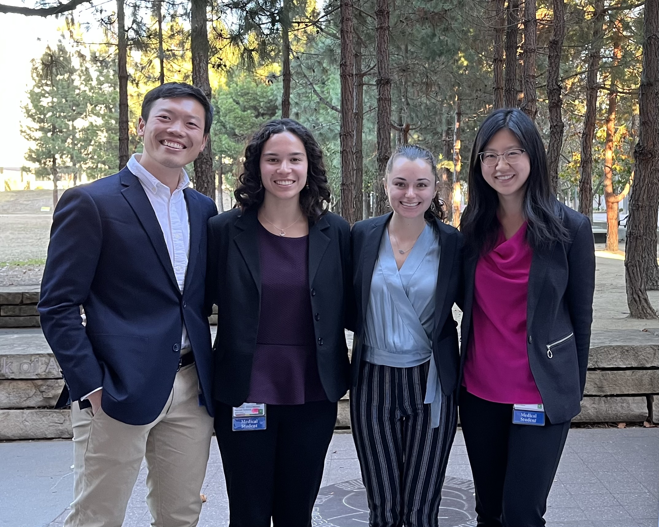 Hannah Schmidt, second from the left, with her fellow classmates at the HSI Symposium