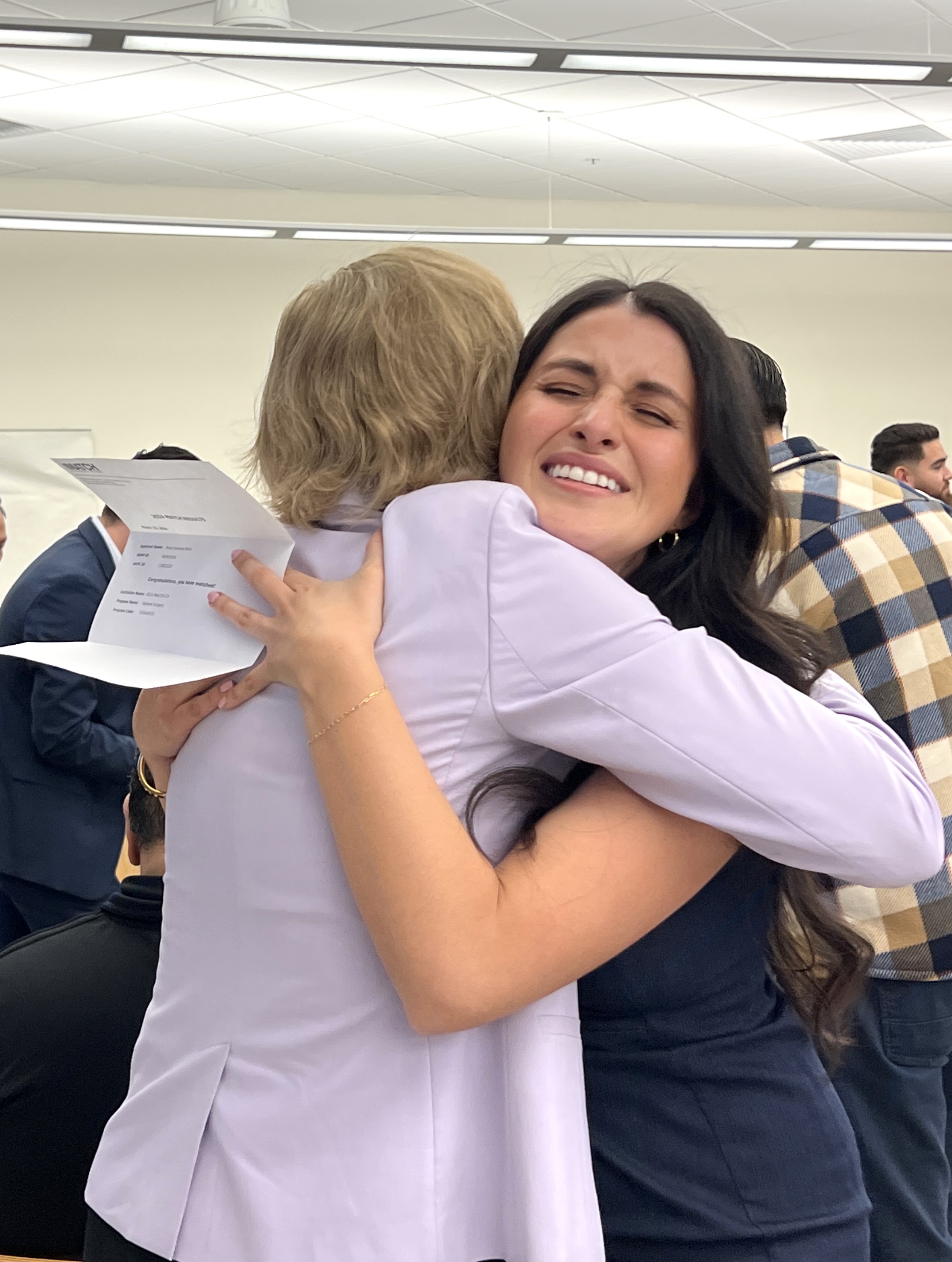 Two people hugging
