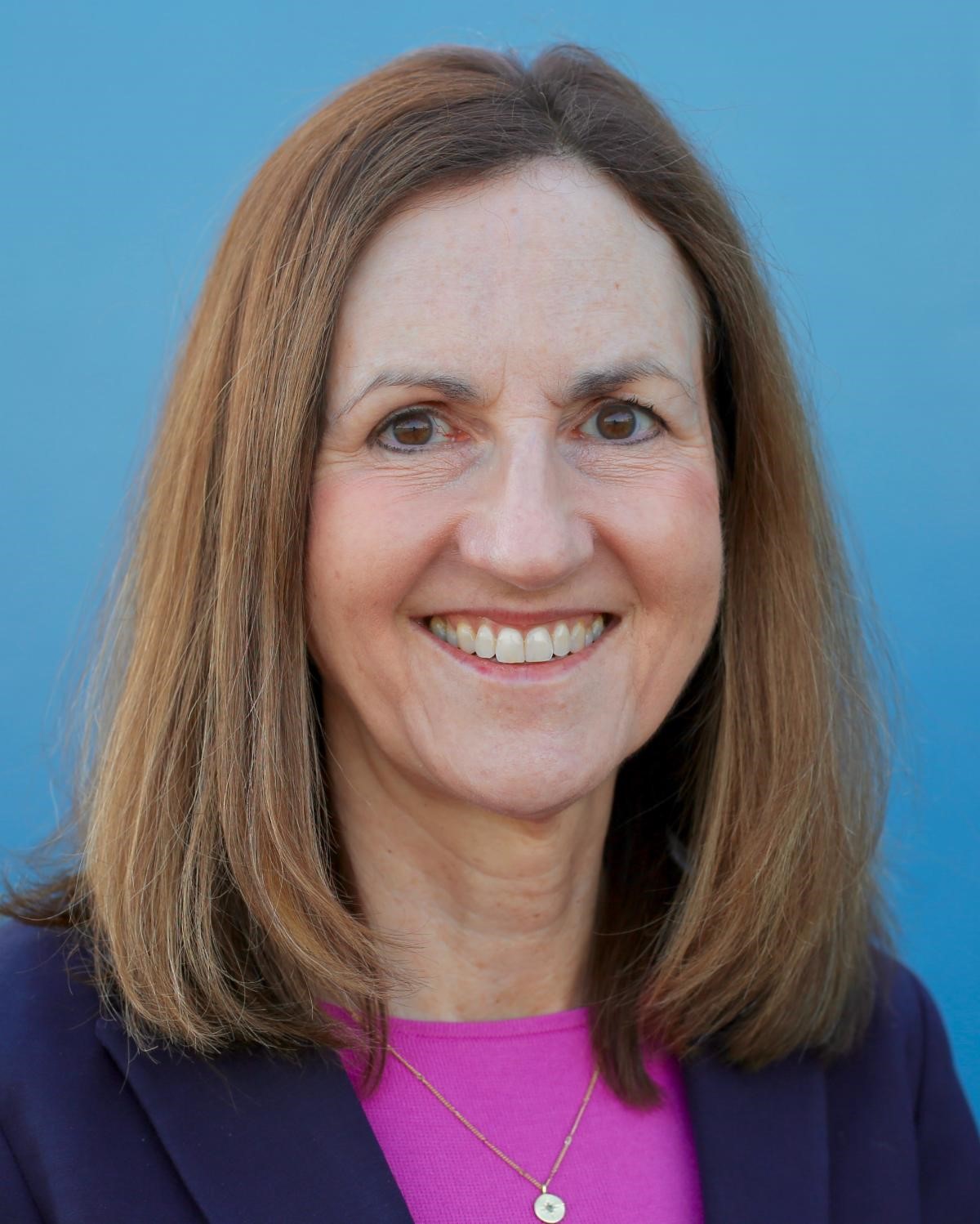 Close up photo of a woman smiling