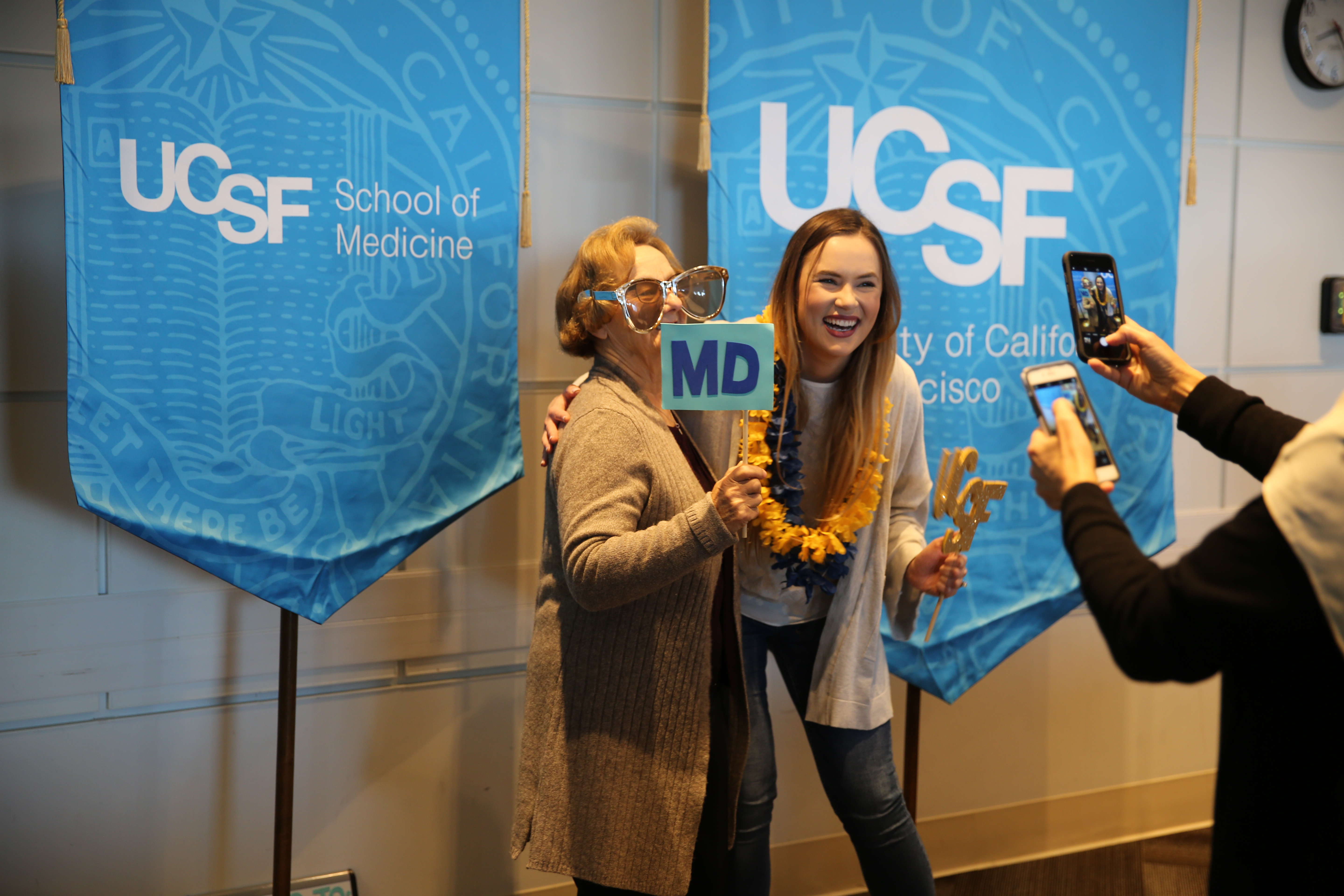 student celebrating with parent on match day 2019