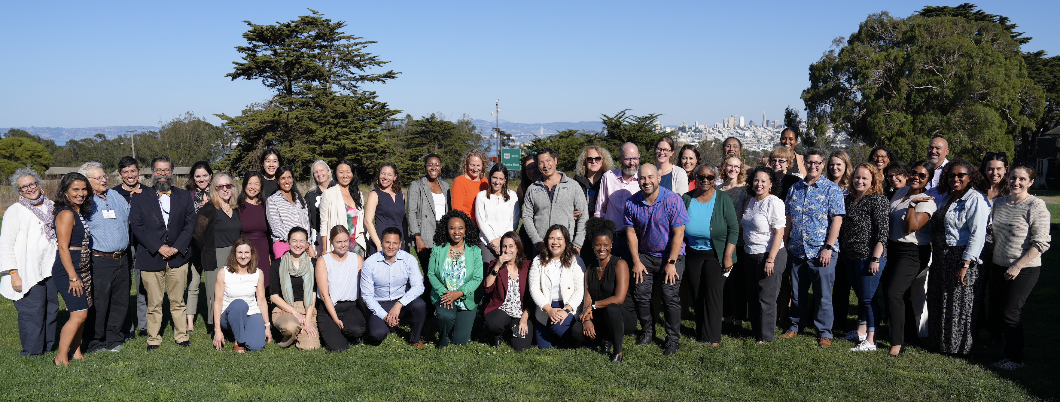 Group photo with San Francisco skyline in background