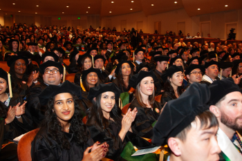 UCSF medical students wearing graduation gowns