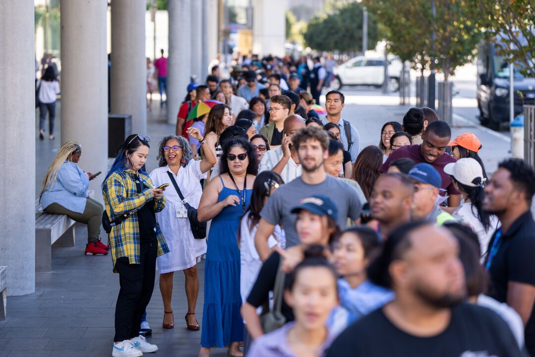 people standing in a line outside